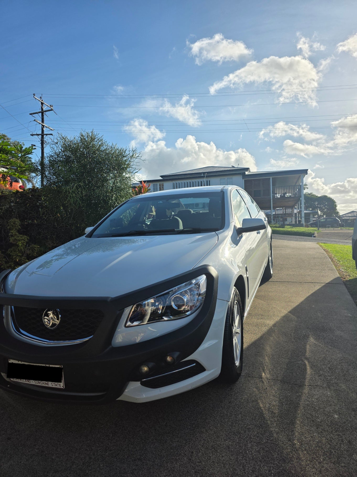 Mobile car detailing Babinda Tully - shiny Commodore exterior after